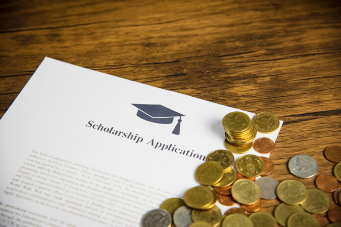 Scholarship application document contract form concept with mone
